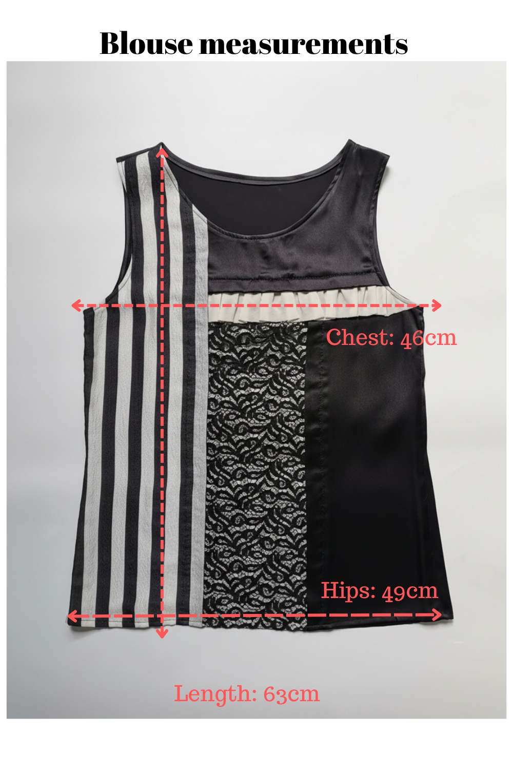 Black and white striped blouse with measurements on a gray background