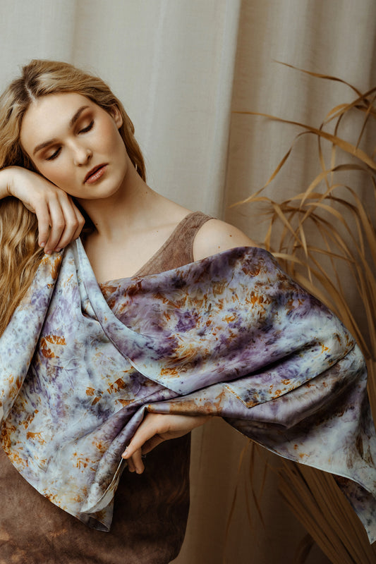 women holding colourful botanical dye silk scarf