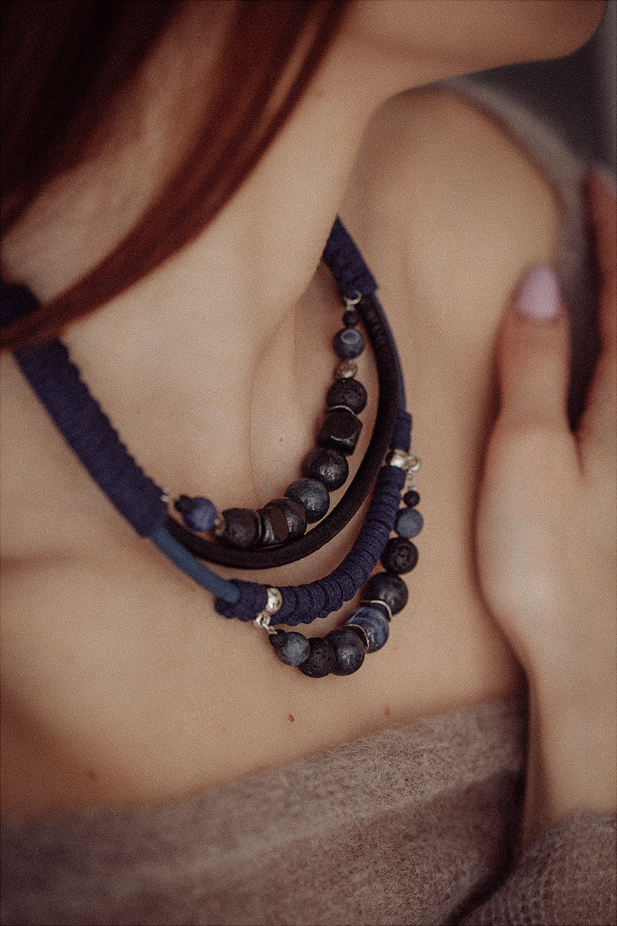 Bead and leather bib necklace