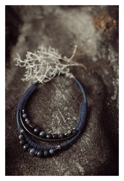 Bead and leather bib necklace