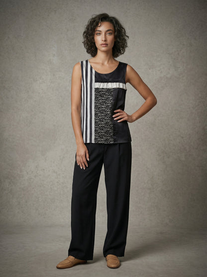 women wearing black and white colour block silk tank top