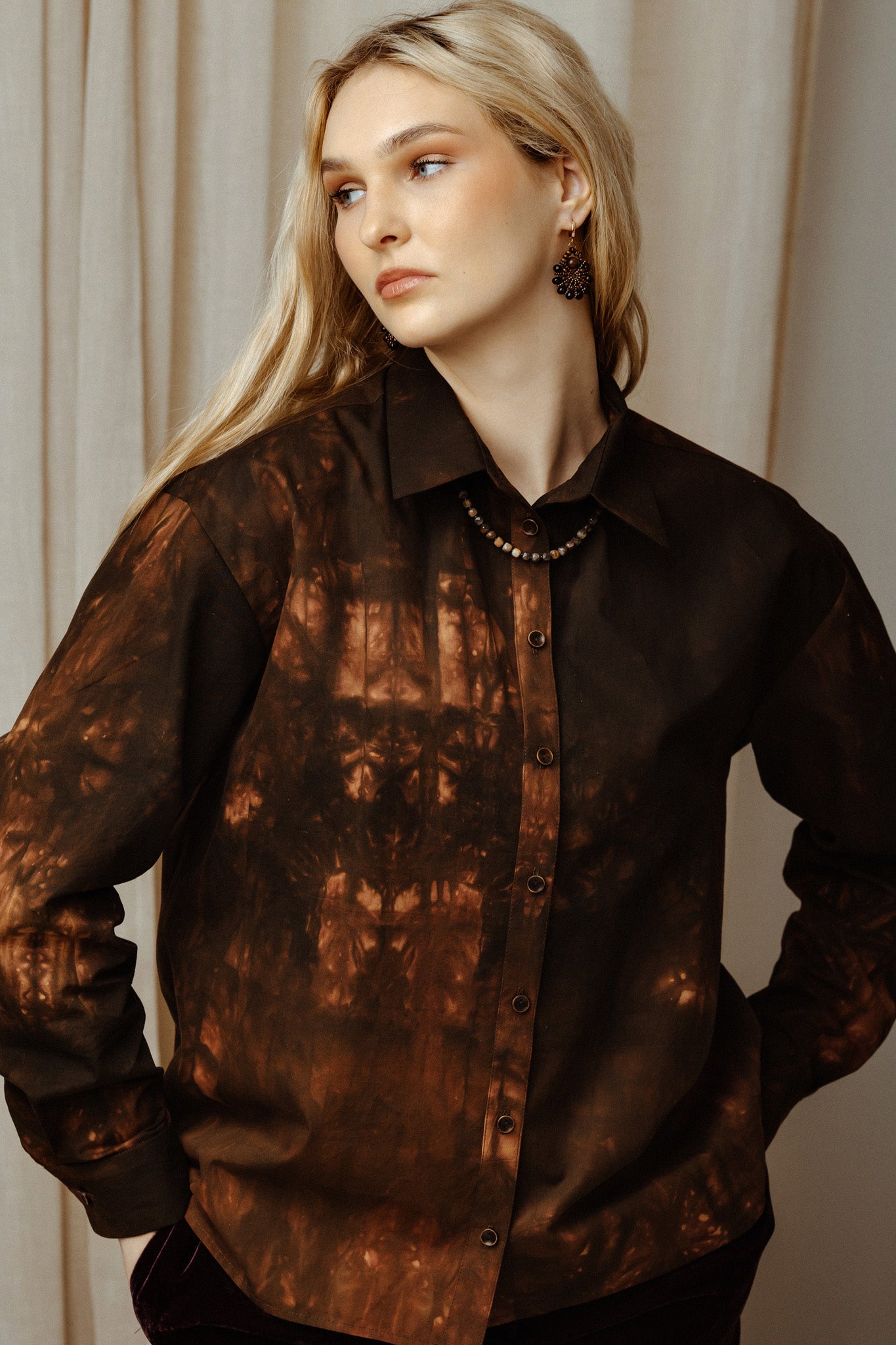 women wearing brown colours tye-dye boho shirt