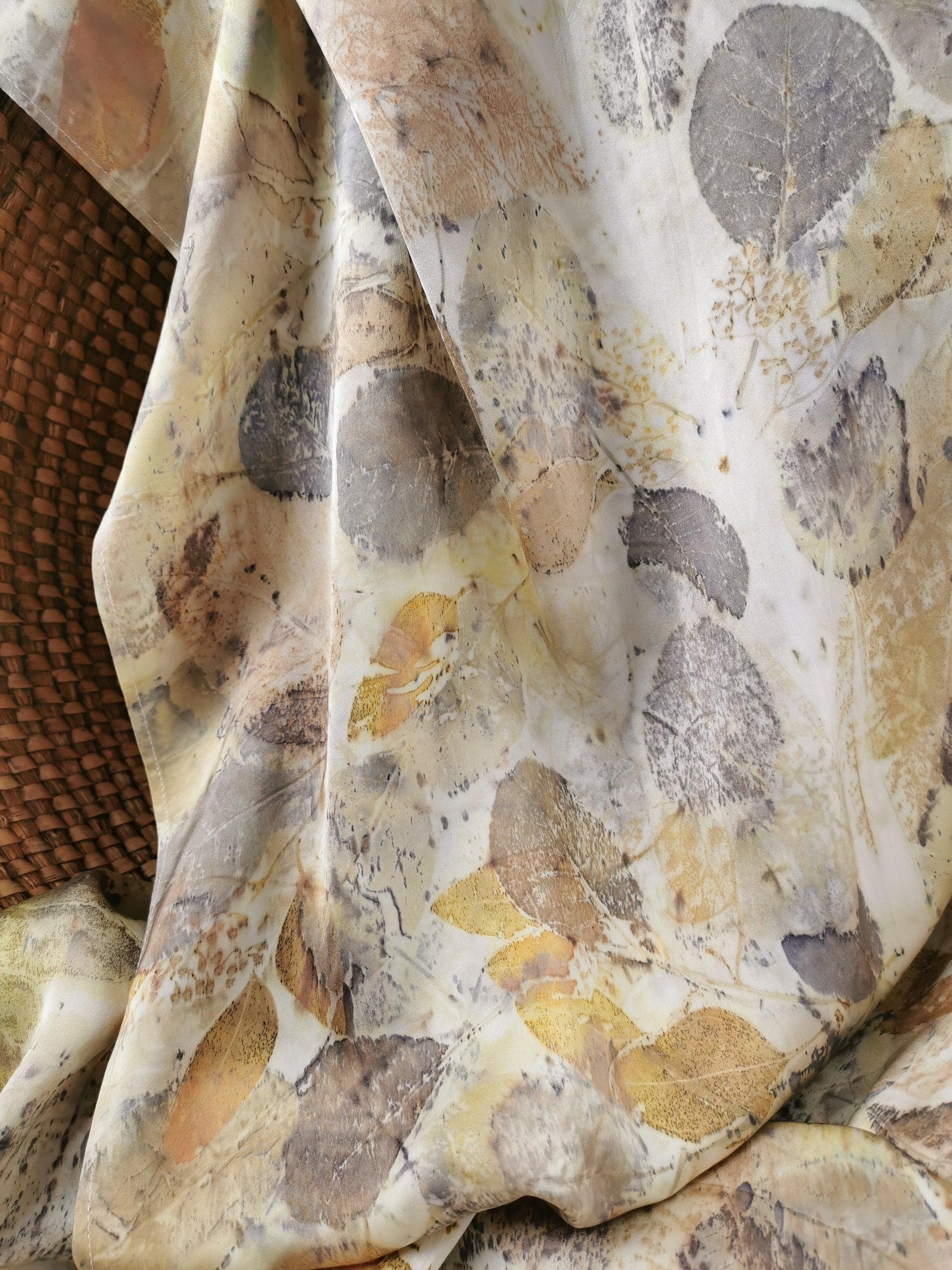 leaf eco-printed silk scarf with leaf pattern in neutral colours