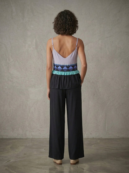 women wearing mint silk strap blouse 