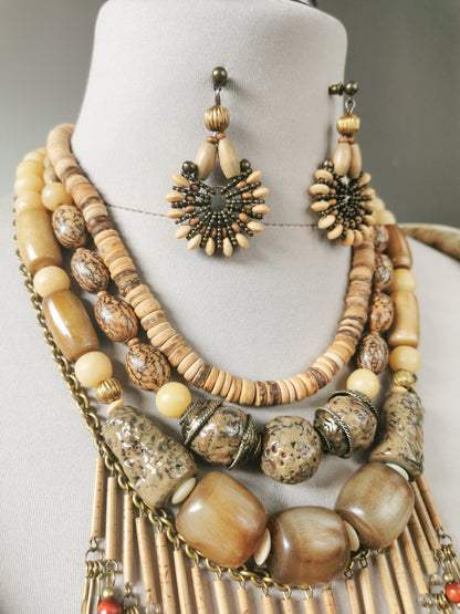 Jewelry set with necklace and earrings on a mannequin bust