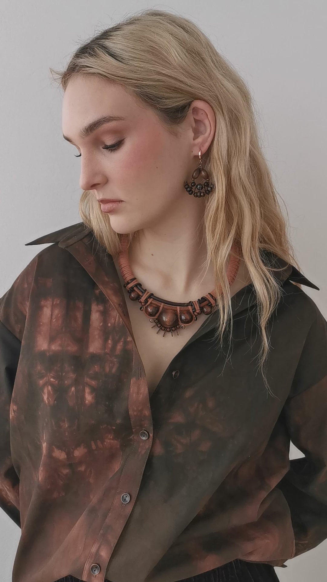 model wearing boho leather cord and bead necklace