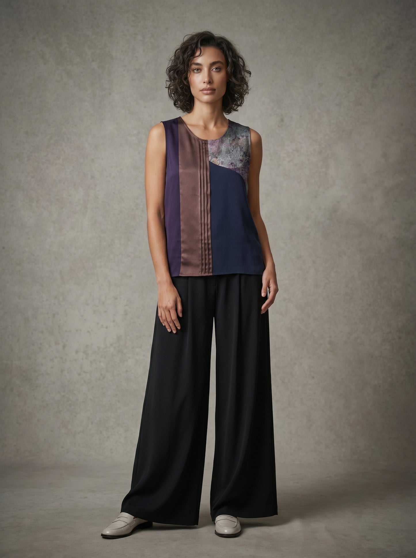 model wearing purple tank top