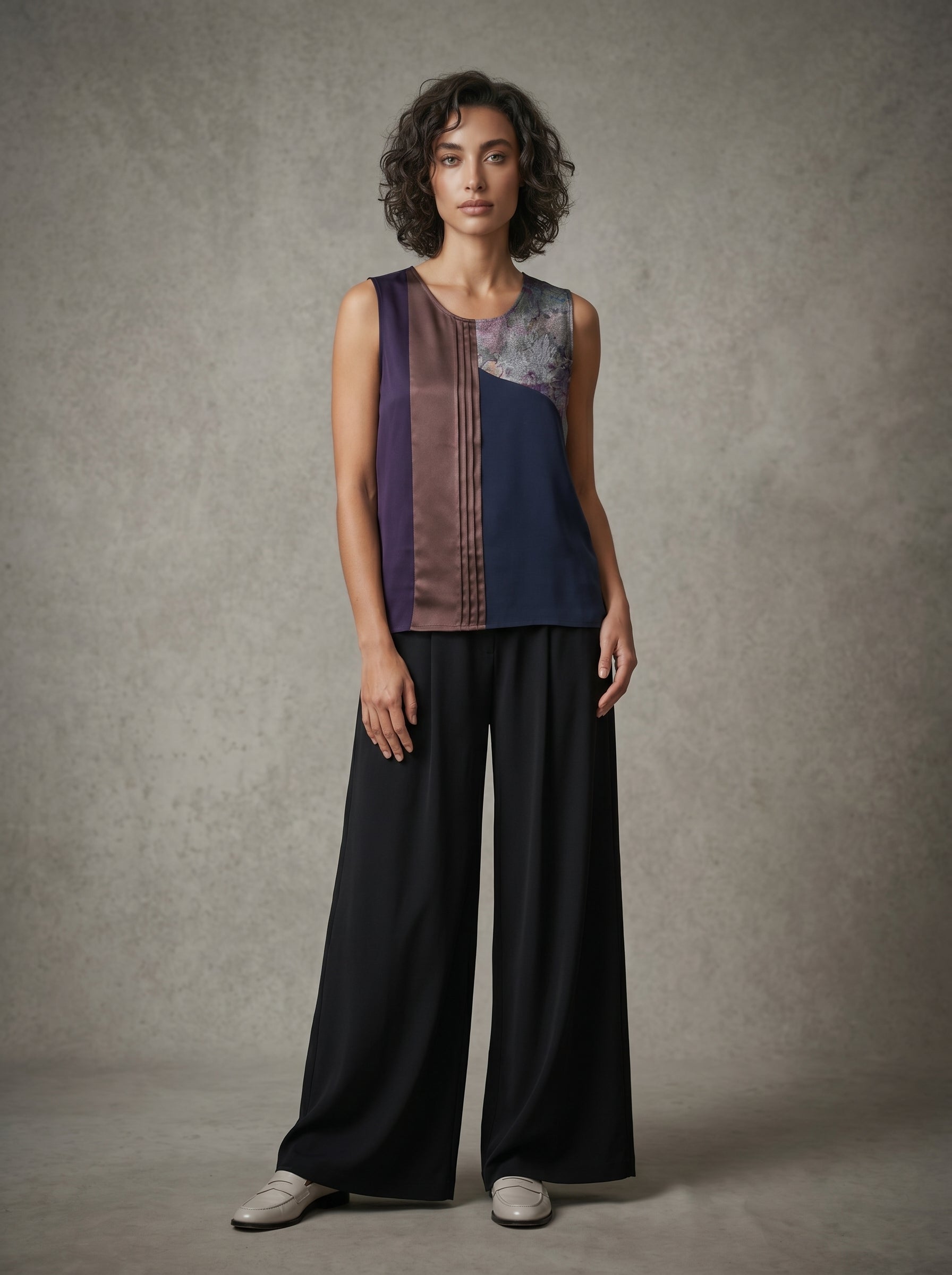 model wearing purple tank top