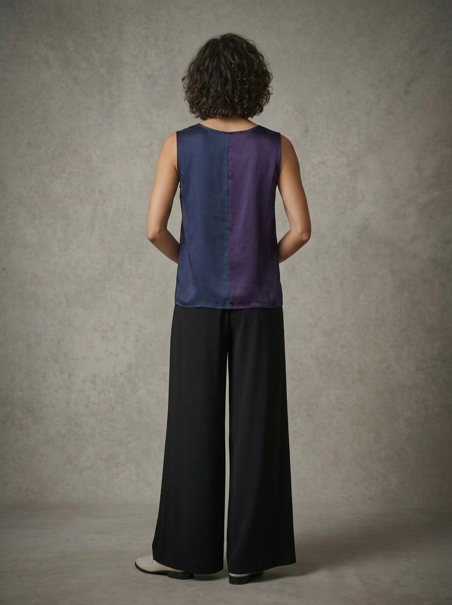 model wearing purple tank top