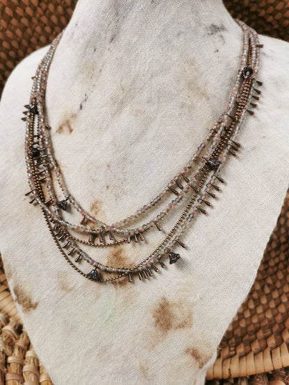 dainty seed bead multilayer necklace on a jewelry stove