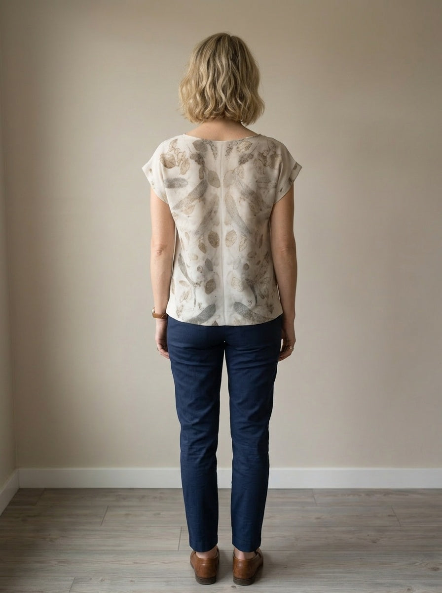 women wearing short sleeve blouse with plants prints