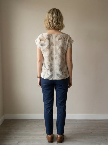 women wearing short sleeve blouse with plants prints