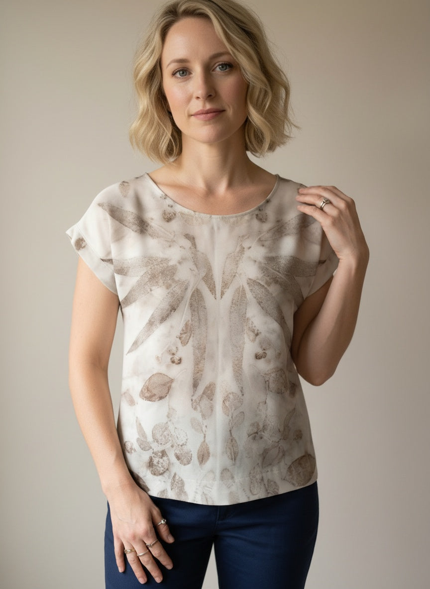 women wearing short sleeve blouse with plants prints