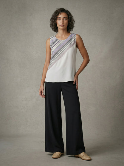 women wearing white and lavender silk tank top
