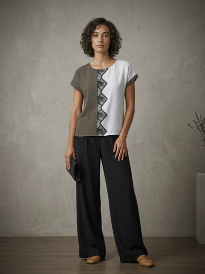 women wearing grey and white top with lace 